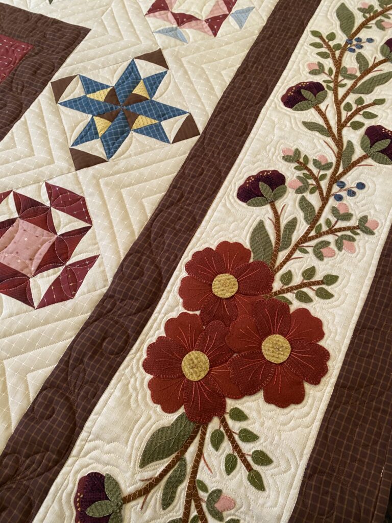 Primrose Garden Block of the Month - Designed by Katie Solberg, owner of Pieceful Gathering Quilt Shop, and KL Designs. Finished size is 89 1/2”x 89 1/2” | KLDesignsOnline.com | Wool Applique Patterns by Karen Yaffe at KL Designs