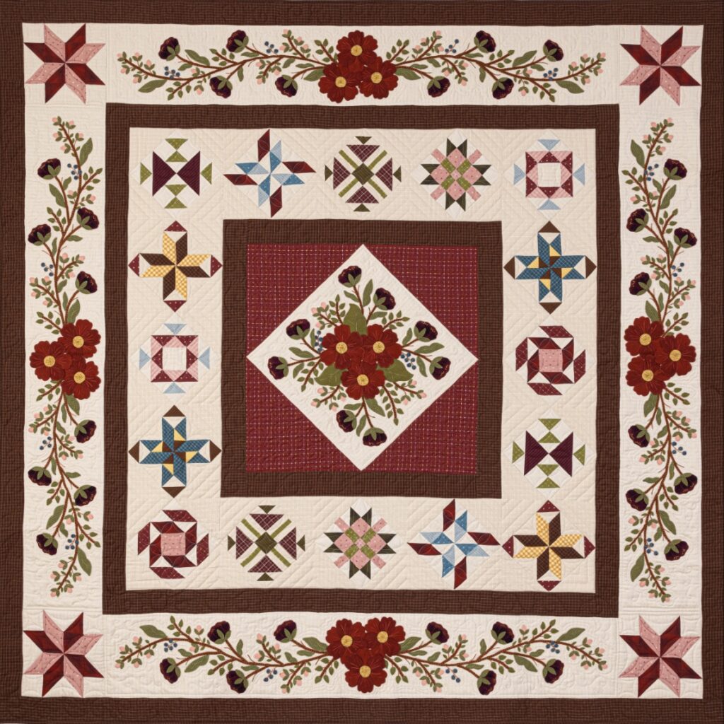 Primrose Garden Block of the Month - Designed by Katie Solberg, owner of Pieceful Gathering Quilt Shop, and KL Designs. Finished size is 89 1/2”x 89 1/2” | KLDesignsOnline.com | Wool Applique Patterns by Karen Yaffe at KL Designs