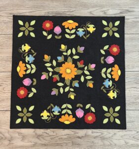 Spring Melody - Finished Size: 26” x 26” | KLDesignsOnline.com | KL Designs by Karen Yaffe | Hand Designed Wool Appliqué Patterns by Karen Yaffe